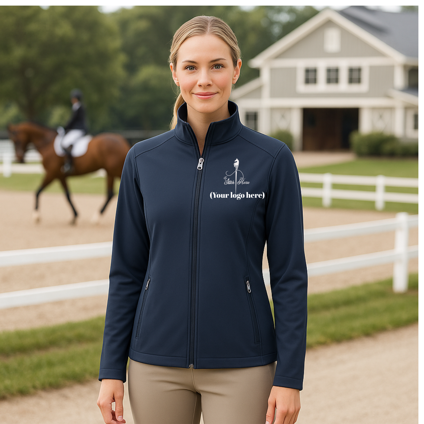 Woman wearing a navy blue jacket with a logo in an equestrian setting